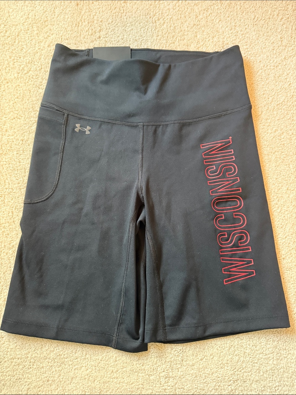 Under Armour Black Women’s Wisconsin Logo Bike Shorts with Red Accent